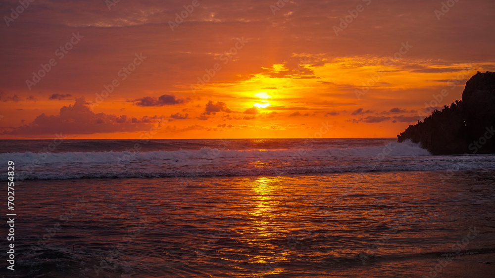 Beautiful sunset at Kukup Beach in Central Java, Indonesia