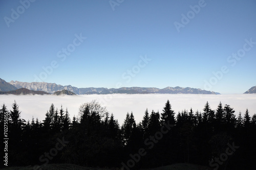 Mountains in Berchtesgadener Land, Alps in Bavaria, submerged in clouds photo
