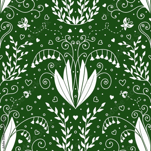 Seamless pattern of spring plants, flowers and insects on green background. For wallpapers, wrapping paper, fabric, textile, notebook covers, book flyleaves etc. photo