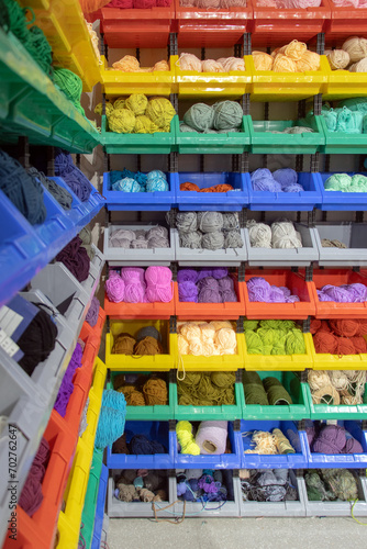 Colorful yarn balls on the shelf