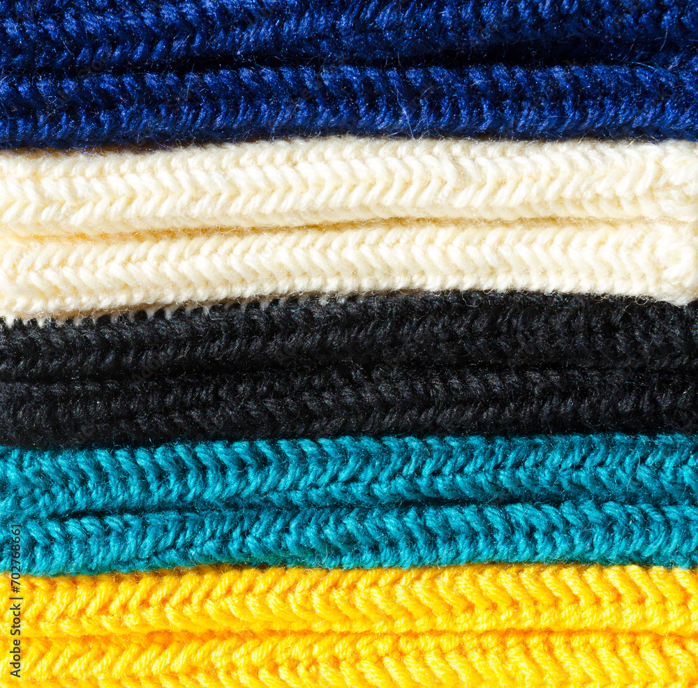 Mittens made of wool yarn close-up. Mittens made of wool yarn close-up.