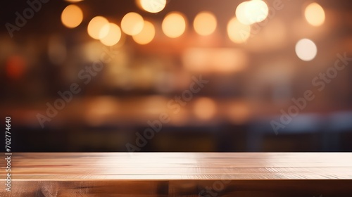 Wooden table against bokeh of lights in background