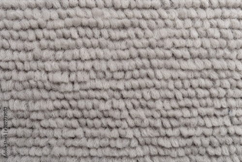  a close up view of the texture of a knitted wool material, which is very soft and soft looking.
