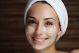 young woman with a mask applied to her face. Female face with cosmetic skin care mask.