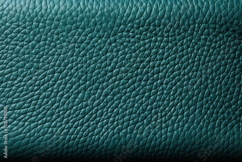  a close up of a teal leather texture with a small amount of stitching on the top of it.