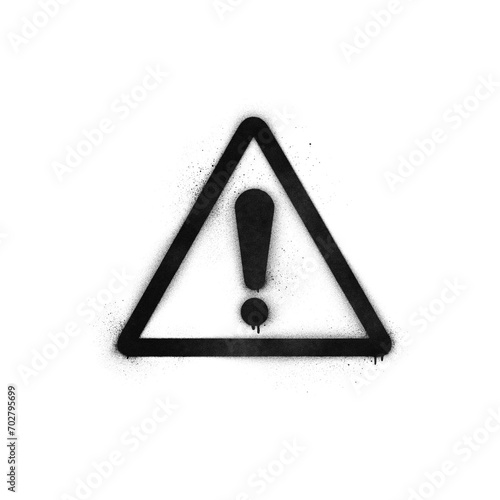 Graffiti-style warning symbol stencil with spray paint effect isolated on transparent background photo