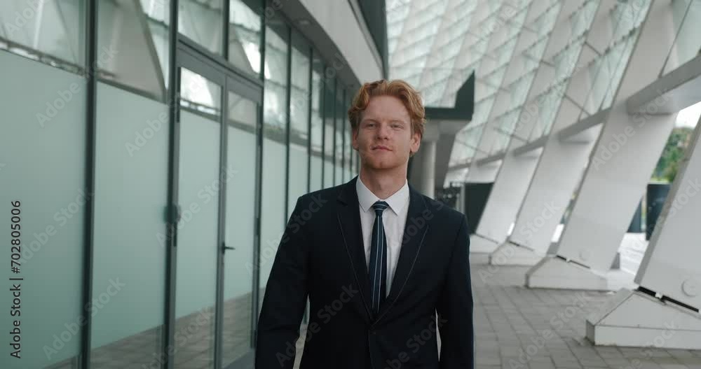 Stylish redhead man strides forward on street his energy palpable in each step Energy walk embodies self-love and confidence. Close-up reveals his energy mix of style and self-assuredness. Stylish redhead man strides forward on street his energy palpable in each step Energy walk embodies self-love and confidence. Close-up reveals his energy mix of style and self-assuredness.