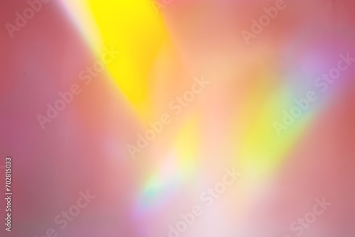 Defocused abstract purple background with rainbow flare from sunlight, holiday backdrop, celebration wallpaper. Colorful sparkle sun glare, Glittering aesthetic textured photo pattern, trend