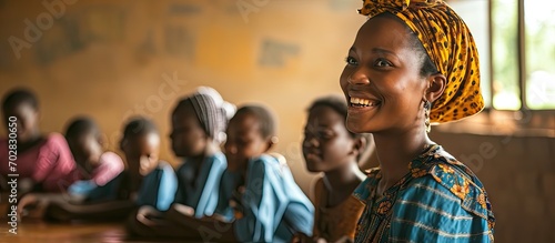 Happy African teacher commu...