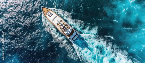Large white boat on blue wa...
