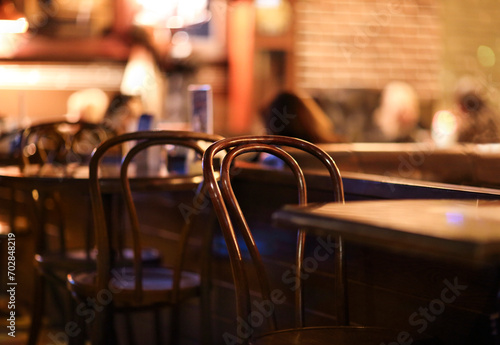 People in coffee shop blur background