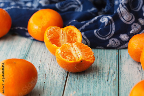 tangerines on wooden background