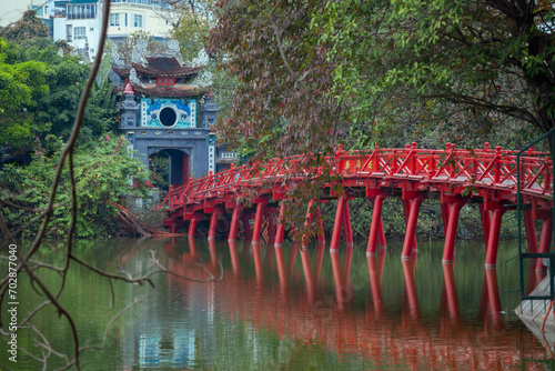 red The Huc bridge over the lake Hoan Kiem Ha Noi Vietnam photo