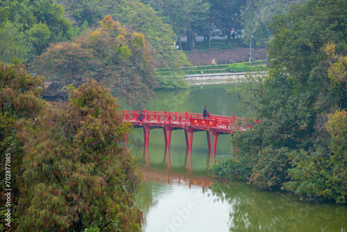 red The Huc bridge over the lake Hoan Kiem Ha Noi Vietnam photo