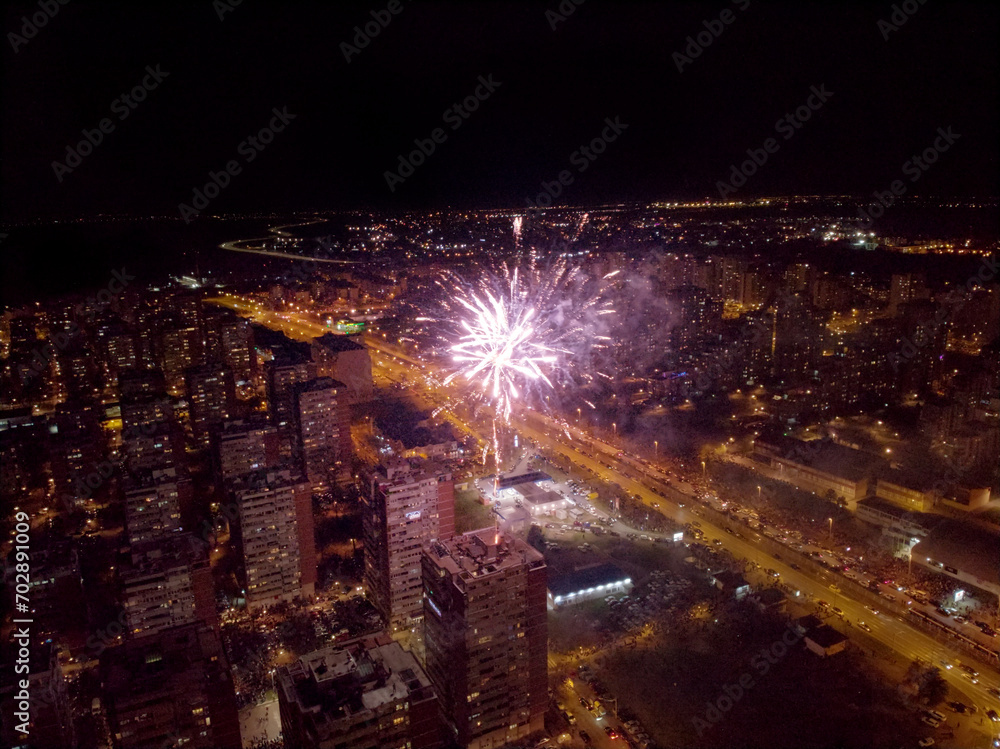 New Year fireworks over building in a city