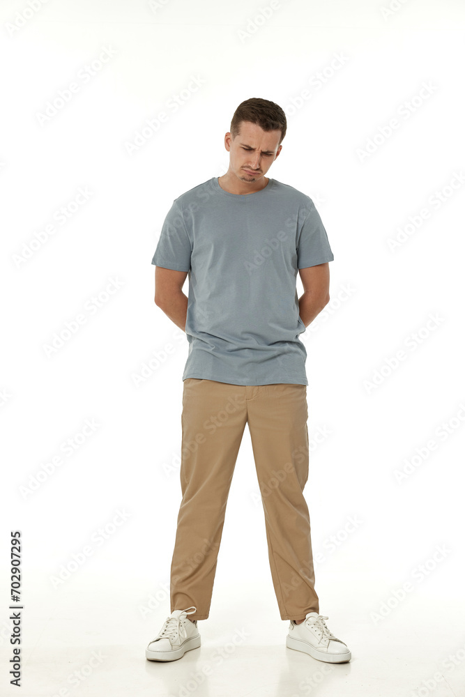 offended frustrated young man on white background. sadness offended frustrated young man on white background. sadness
