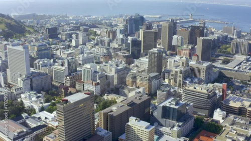 Drone of buildings, ocean and city background for urban development, travel and architecture or infrastructure. Aerial view of cityscape, commercial property and location of Cape Town, South Africa