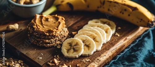 Snack with Nordic rye crispbread, homemade peanut butter, and Canarian banana slices photo