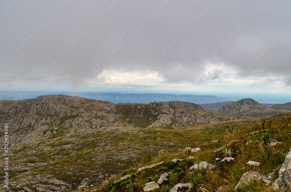 Mountains in the state of Minas Gerais in Brazil. This region is inland and is called Lapinha da Serra and is part of the mountain range called Espinhaco. This mountain range is made up of high peaks,