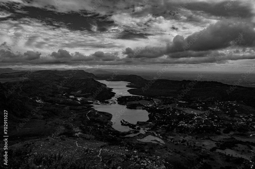 Obraz premium Lake in the village of Lapinha da Serra in the state of Minas Gerais in Brazil. This lake was formed by an electric power company to generate energy for the region. But its scenic beauty attracts tour