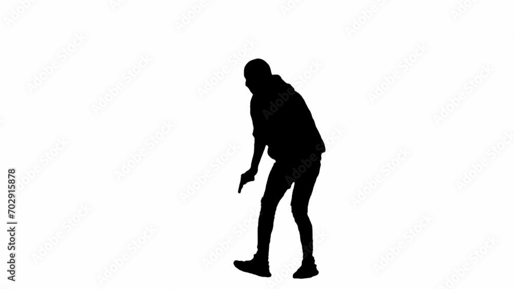 Black silhouette of thief on isolated white background. Male robber in hoodie and balaclava walking with a gun in his hands, preparing to commit a crime. Half-turn. Black silhouette of thief on isolated white background. Male robber in hoodie and balaclava walking with a gun in his hands, preparing to commit a crime. Half-turn.