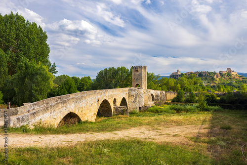 stone bridge over Ebro river in Frias, Burgos province, Castilla Leon, Spain photo