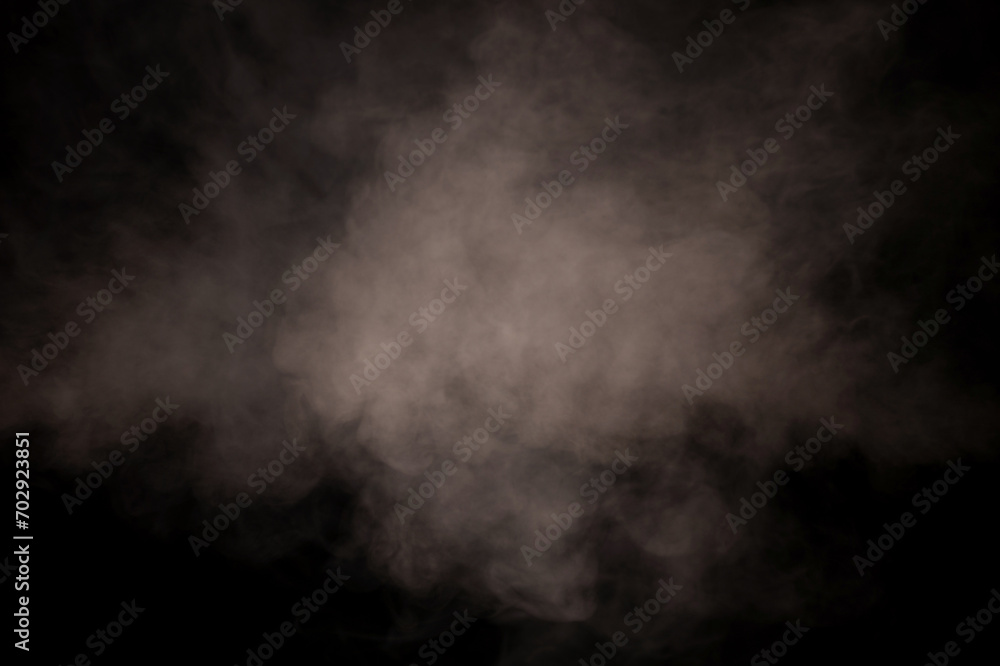 White steam on a black background.