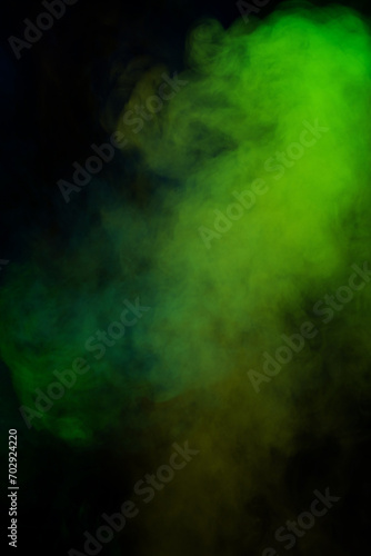 Blue and green steam on a black background.