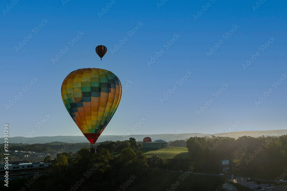 Fototapeta premium Hot air balloon drifting of the landscape