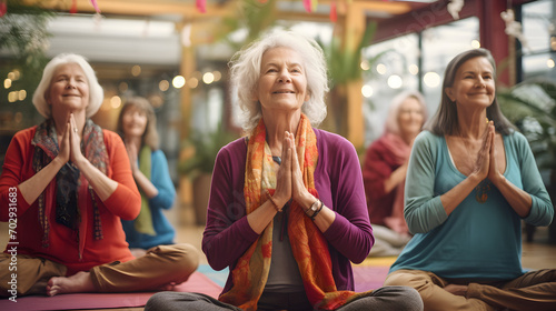 A candid, authentic glimpse of a group of elderly women engaged in a yoga class, embodying an active retirement lifestyle through mindfulness and wellness