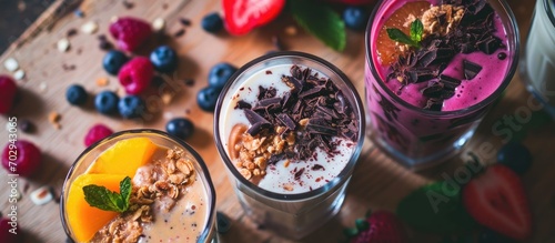 Nutritious smoothie with nut butter, milk, fruit, and chocolate. photo