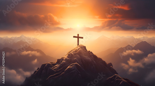 Wooden cross silhouette on rocky mountain top or peak, sunrise on the sky. Christian faith or religion, crucifixion of Jesus Christ, Calvary sacrifice for salvation and forgiveness photo
