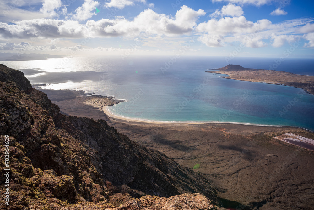 View of La Graciosa island from Mirador Del Rio. Lanzarote. Canary Islands. Spain. Lens flare.
