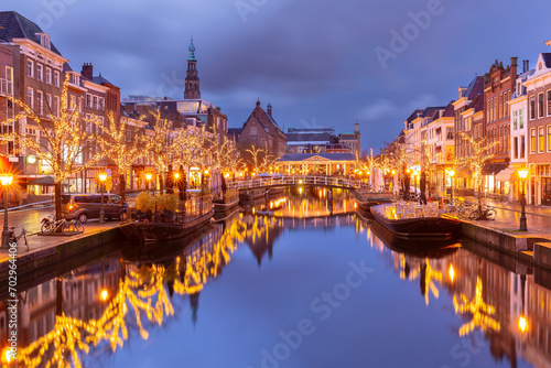 Night Leiden canal Oude Rijn and City Hall in Christmas illumination  Holland  Netherlands.