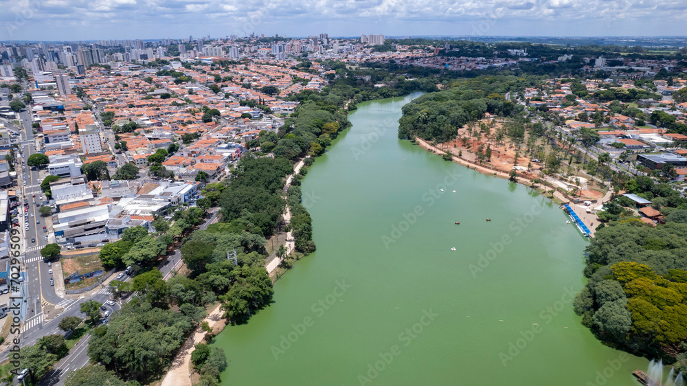 Fototapeta premium Aerial view of Taquaral park in Campinas, São Paulo. In the background, the neighborhood of Cambui.