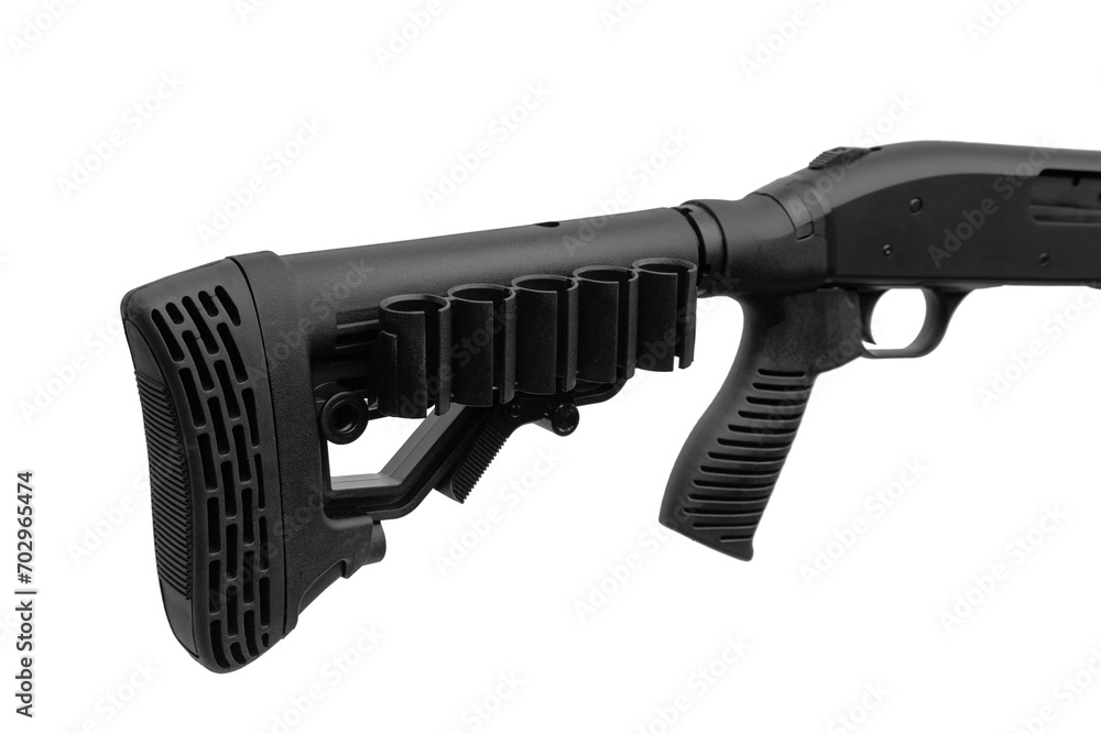 Pump-action 12 gauge shotgun isolated on a white background. Additional handle. A smooth-bore weapon with a plastc stock. Pump-action 12 gauge shotgun isolated on a white background. Additional handle. A smooth-bore weapon with a plastc stock.