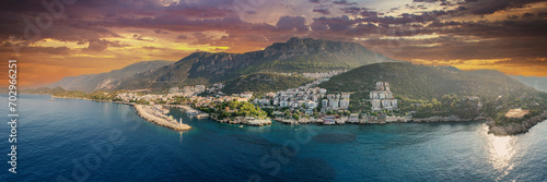 Panoramic view of the touristic Kaş district on the Mediterranean coast with its lush green nature, mountains and deep blue sea. Antalya - Turkey