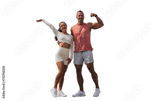 Energetic fitness duo flexing muscles and posing joyfully on a black background photo