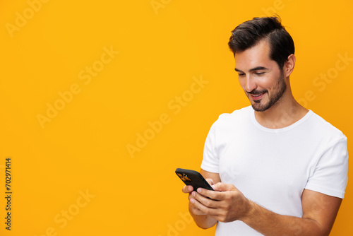 Mobile man smiling happy yellow portrait smartphone copy phone phone cyberspace space communication © SHOTPRIME STUDIO