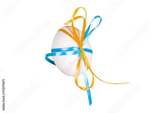  Easter egg with blue and yellow ribbons isolated background. Minimal easter style design concept Happy Easter. Spring holiday