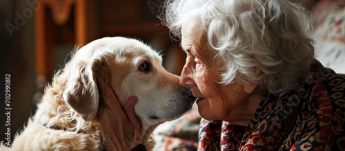 Using pet therapy as treatment for dementia in an elderly woman. photo