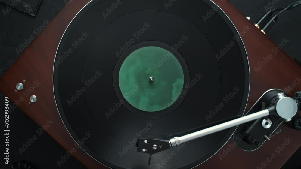 Vidéo Stock Vinyl Record Spinning in Slow Motion on a Turntable, with