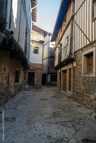 narrow street in the town © mareguera