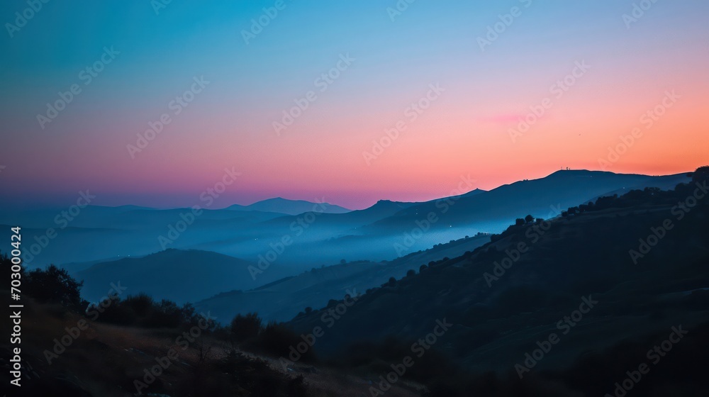 A stunning view of the sunrise at blue hour, with a serene atmosphere and the beauty of the sky painted in shades of blue and purple