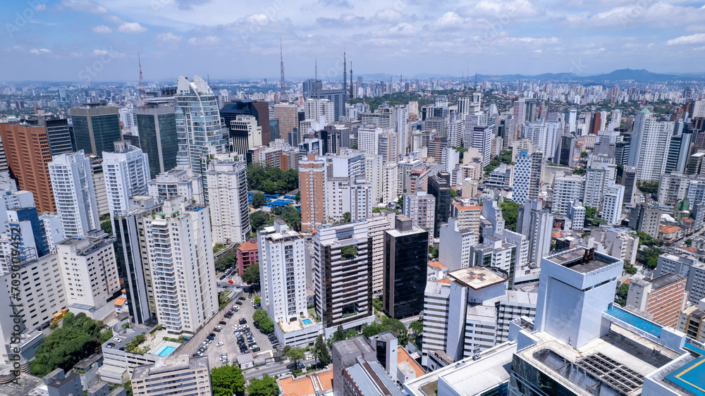 Fototapeta premium Aerial view of Avenida Paulista in Sao Paulo, Brazil. Very famous avenue in the city. High-rise commercial buildings and many residential buildings