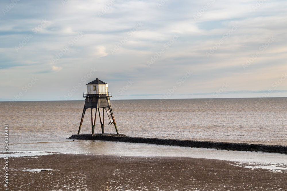 Lighthouse in the sea, Dovercourt low lighthouse at low tide built in 1863 and discontinued in 1917 and restored in 1980 the 8 meter lighthouse is still a iconic sight,