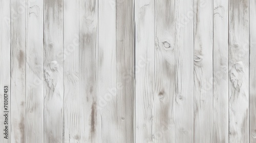  a close up of a wooden fence with a bird perched on top of the fence and a bird sitting on the fence.
