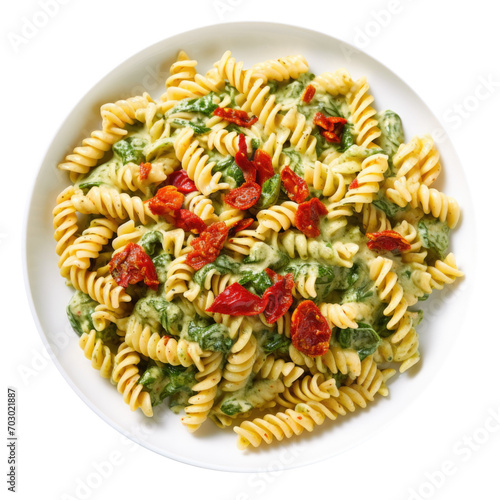 Delicious Plate of Rotini Pasta with Spinach and Sun Dried Tomatoes Isolated on a Transparent Background  photo