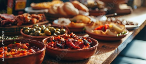 Spanish tapas featuring pork delicacies. photo