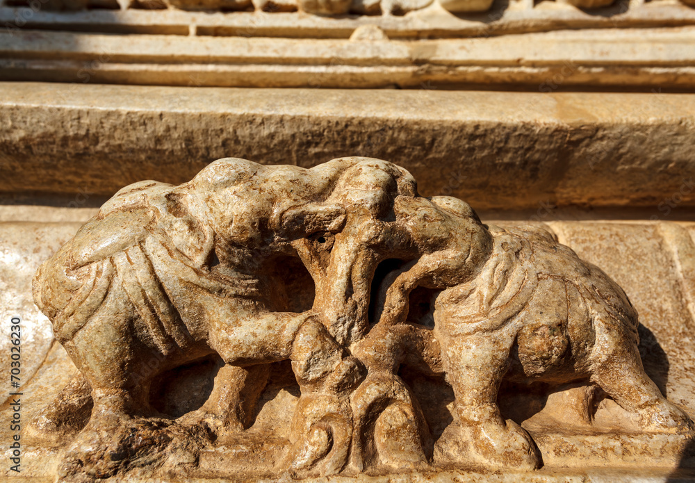 Fighting elephant sculptures inside of the Adinatha temple, a Jain temple in Ranakpur, Rajasthan, India, Asia
